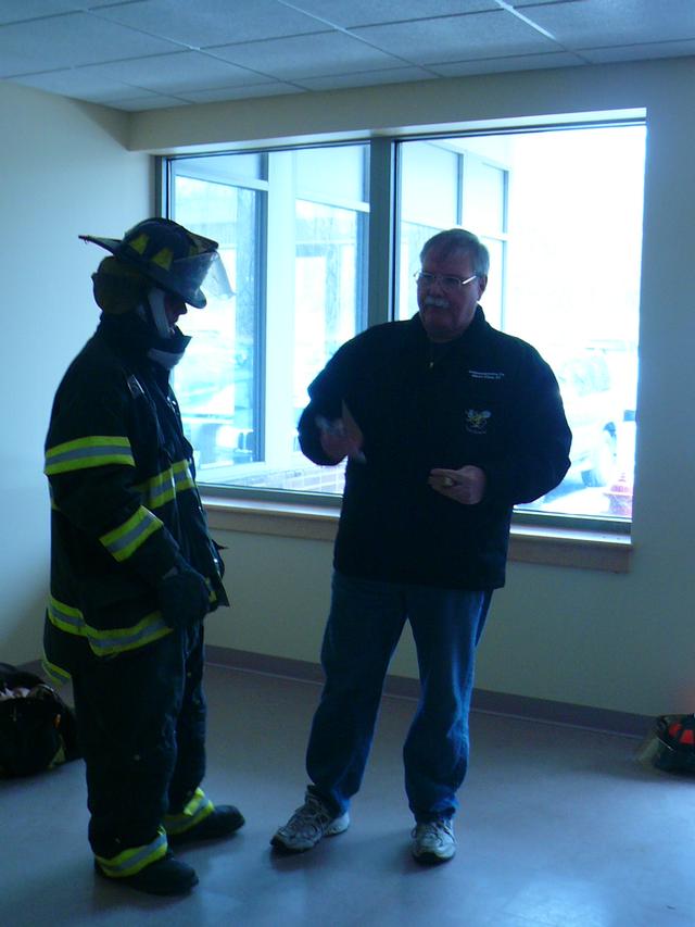 IFCO FF Jim Tipa illustrates the different parts of a FF's PPE at FLHS Wellness Day. (4/23/09)
